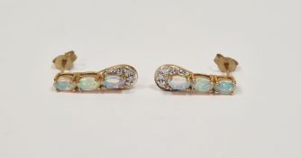 Pair gold-coloured metal, opal and diamond earrings set three oval opals and small diamonds
