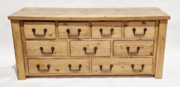 Large 20th century chest of drawers having a bank of nine various sized drawers, each with cast iron