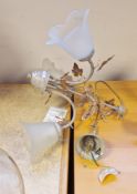 contemporary light fitting, comprising: , and a three light pendant, issuing distressed branches,