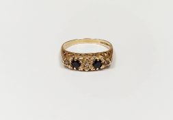 9ct gold, sapphire and diamond ring set two sapphires and three small diamonds, in illusion setting