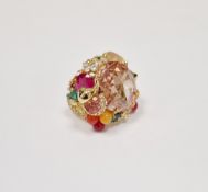 Kate Spade exuberant costume ring set with variously coloured fruit, flowerheads and a snail