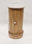 Marble-topped pine pot cupboard of cylindrical form, with ceramic handle, 74cm high x 39cm diameter