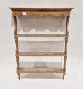 Pine three-tier wall hanging shelving unit, 107cm high x 79cm wide