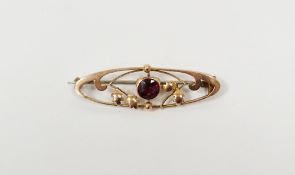 Gold-coloured bar brooch set single cut amethyst collet set within leaves