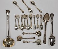 A matched set of George IV and William IV silver spoons, including a large silver serving ladle,