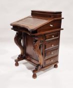 Modern stained hardwood davenport with gilt tooled leather insert and a bank of four short drawers