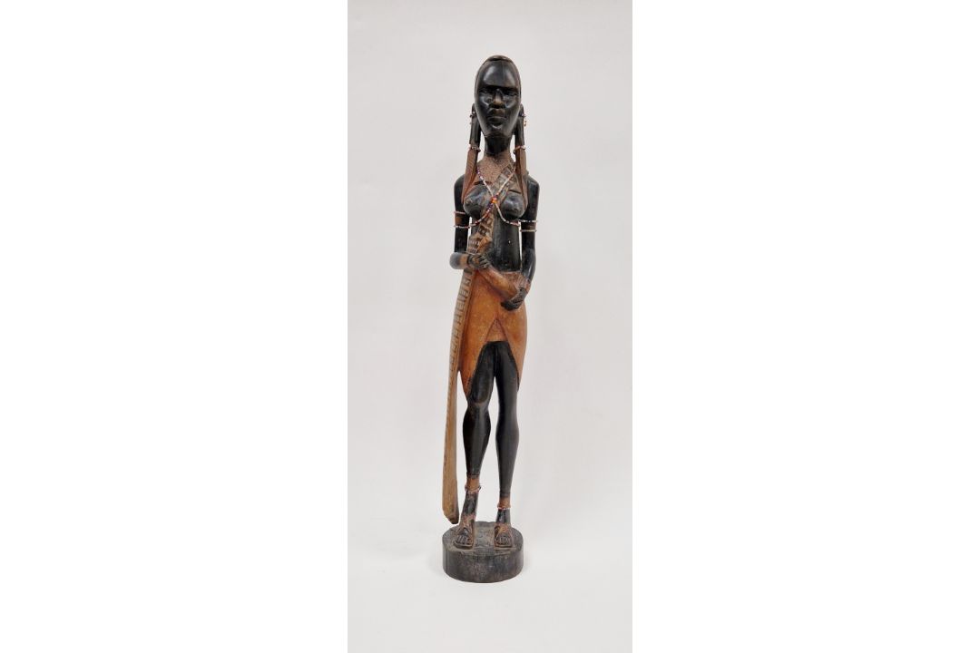 Carved wooden figure of an African girl with beaded decoration to her ankles and chest, 62cm high - Image 1 of 4