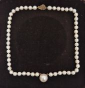 String of cultured pearls with central large mounted blister pearl, on 9ct gold clasp, cased
