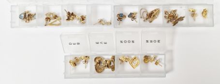 Quantity of gold and gold-coloured earrings, variously set and shaped