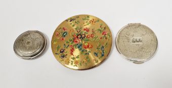 Kigu silver compact, engine-turned, a silver-coloured metal circular small compact and a gilt