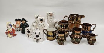 Collection of Staffordshire pottery including a group of copper lustre jugs, a two-handled loving