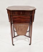 Edwardian mahogany sewing table of octagonal form with lid opening to reveal a fitted interior, with