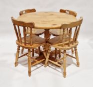 Modern pine breakfast table of circular form, 75cm high x 90cm diameter and four matching dining