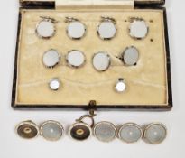 Set of white gold and mother-of-pearl cufflinks and dress studs, in fitted case, marked 9ct, a