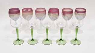 A set of six frosted glass hock glasses, moulded decoration and red rims, possibly by Rueven, 18cm