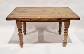 19th century pine dining table of rectangular form, on turned legs, 74cm high x 138cm long x 91cm