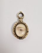 Georgian gold-coloured metal lovers eye painted pendant, oval with eye painting, on ivory, beneath