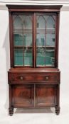 George IV mahogany secretaire bookcase enclosed by pair of glazed gothic bar doors, flanked by