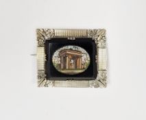 White metal mounted micro-mosaic brooch depicting ancient square-topped arch