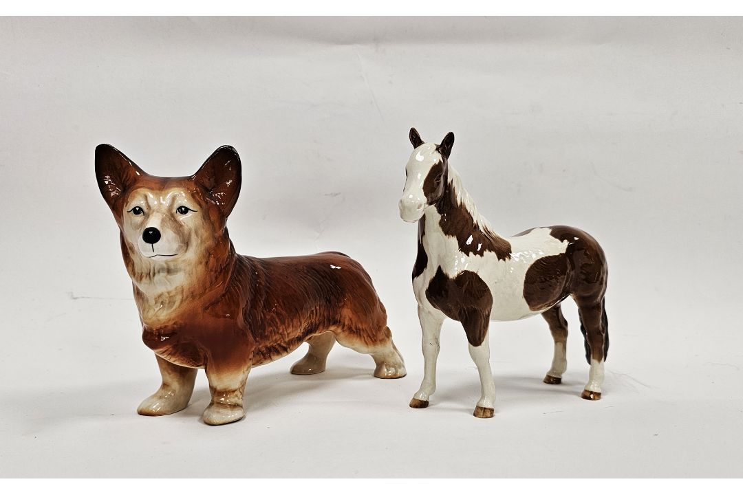 Beswick pottery Pinto pony in skewbald colourway, printed black marks, 17cm long and a vintage - Image 1 of 4