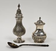 Silver pepperette, Chester 1899, a silver plated sugar caster and one other item (3)