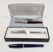 Three contemporary fountain pens, comprising: a Waterford, boxed and a Cross fountain pen, boxed,