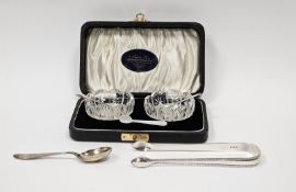 Cased pair of cut glass salts and silver salt spoons, case bearing label for Muir & Sons, Glasgow, a