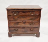 Georgian mahogany chest of four long drawers, each with brass handles, on ogee bracket feet, 80cm