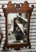 Georgian style carved mahogany and parcel-gilt rectangular wall mirror, with pierced shield-shaped