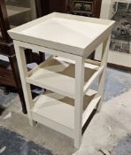 Modern three-tier cream painted side table, 72cm high x 42cm wide x 43cm deep