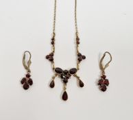 Gold and garnet necklace with pendant drops and similar pair drop earrings