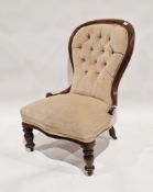 Victorian mahogany button back nursing chair, on turned front legs with castors, 89cm high