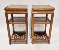 Pair of Chinese Longyanmu (tiger-skin wood) side tables, each of square form with stylised carved