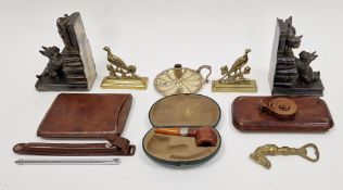 Cased silver-mounted pipe, a 19th century brass chamber candlestick, a pair of cast metal bookends