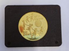 Elizabeth II Canada 100 dollar 22ct gold coin, 1979, half ounce, in original box with certificate