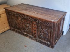 Antique oak coffer of rectangular form, carved geometric motifs from the front panel, 56cm high x