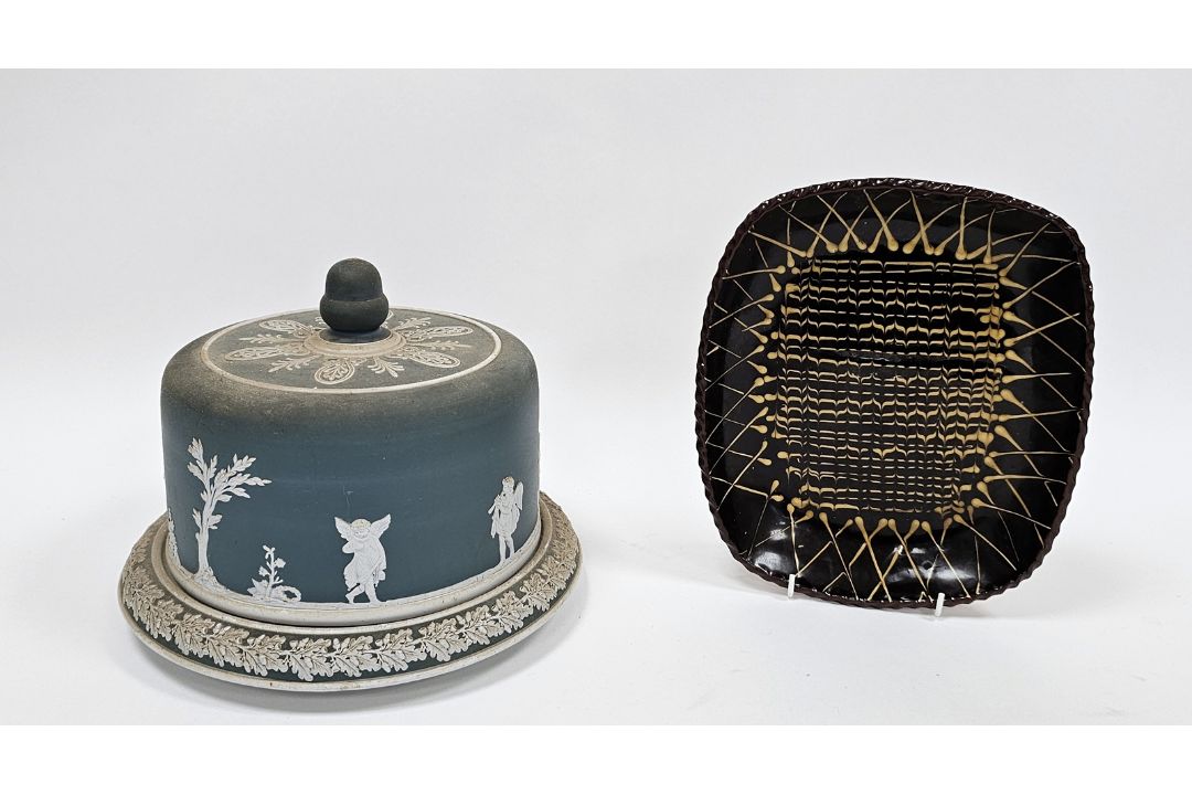 Staffordshire earthenware slip glazed shaped rectangular baking dish, 20th century, decorated with