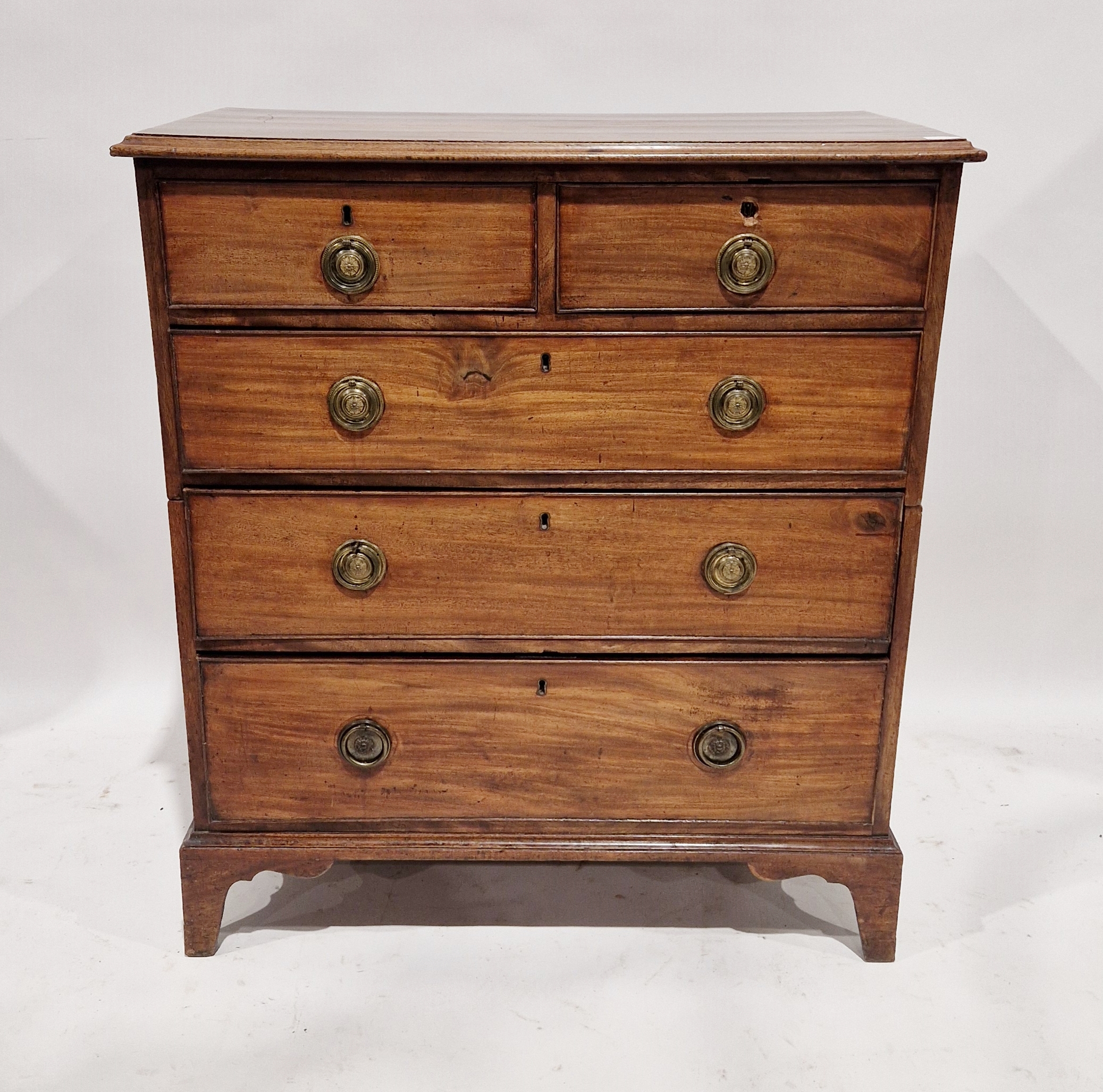 George III mahogany chest of two short and three long graduated drawers with cockbead borders, brass