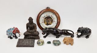 Carved ebony bone-mounted model of an elephant, another painted wooden example, a carved oak