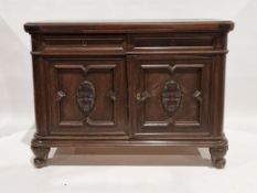 Late 19th/early 20th century stained oak credenza, with moulded oval top above a slide, two panelled