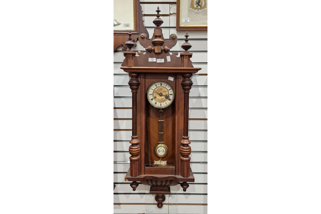 Late 19th century Vienna regulator-style mahogany cased wall clock with three finials to the