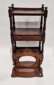 Edwardian mahogany wall bracket with oval mirror and single shaped shelf, 57cm wide and a