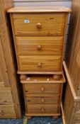 Pair of modern pine bedside chests of drawers, each with three short drawers, on bun feet, 62cm high