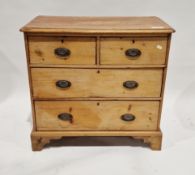 Early 20th century stripped pine chest of drawers, the moulded top above two short drawers and two