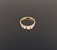 Gold-coloured metal and five-stone diamond ring set five graduated stones in square settings