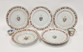 Set of 18th century Chinese export armorial dinner plates, each decorated with a black hatched