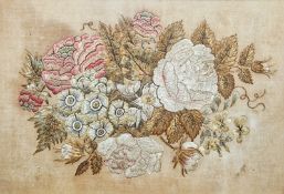 Early 20th century silk embroidery showing peonies, and garden flowers, on silk which has