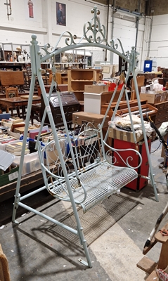 Pale blue painted metal garden swing seat