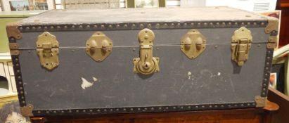 Canvas and metal bound trunk with leather carry handles