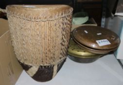 African tom tom drum, a copper chestnut roasting pan and a brass warming pan with turned wooden